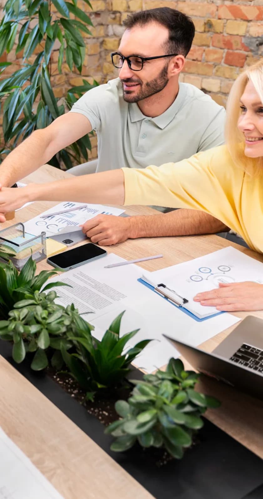 Team members collaborating on hiring